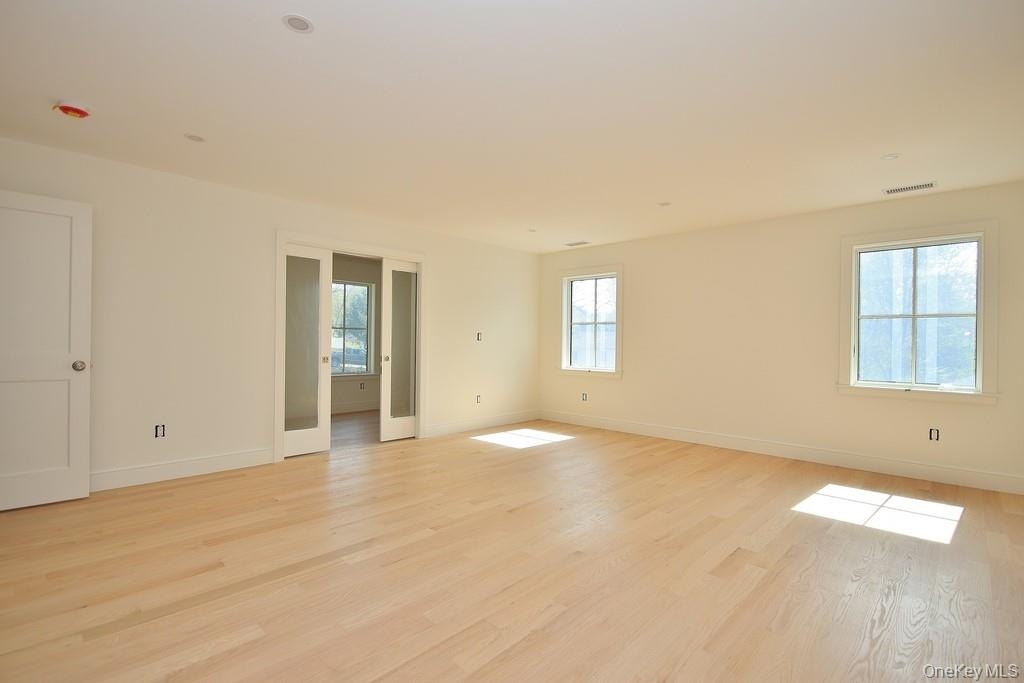 Primary Bedroom has hardwood floors
