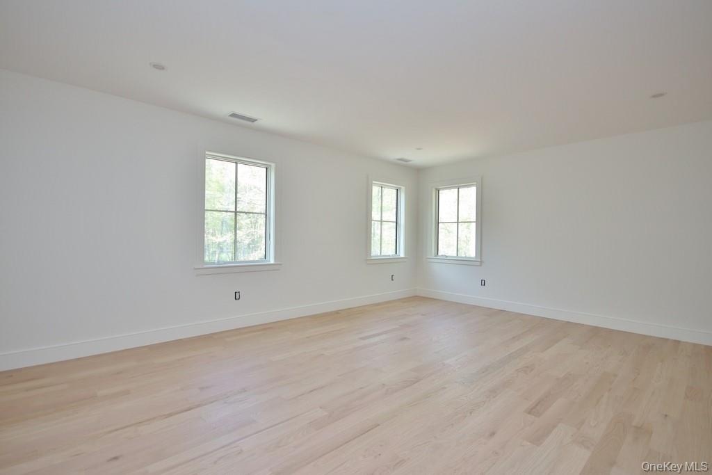 Bedroom has hardwood floors