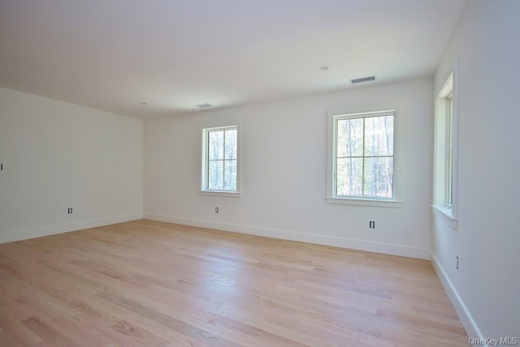 Bedroom has hardwood floors