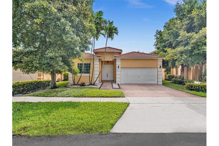 Welcome to Monarch Lakes—gated living in one of Miramar’s most sought-after communities