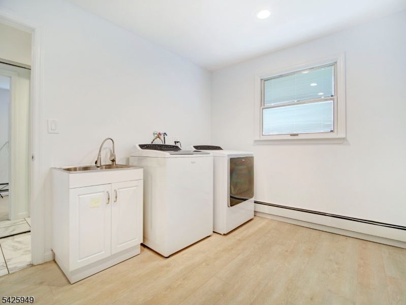 bedroom used as laundry