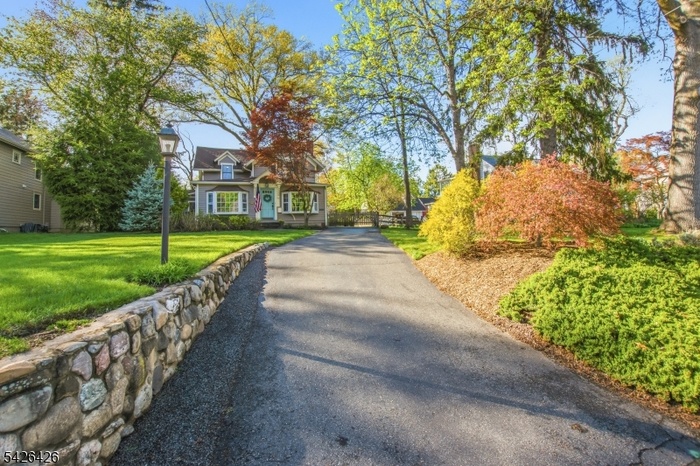 long driveway, set back