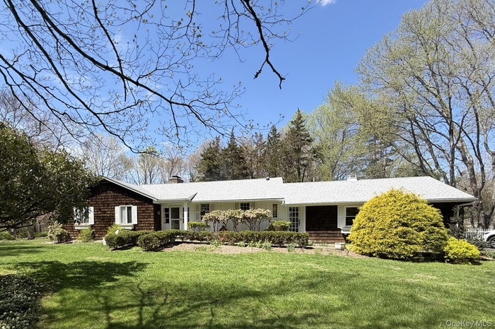 Welcome to 9 Cedar Hill Lane, a Sophisticated Country Ranch!