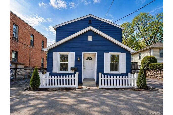 Curb view of house Some pictures are virtually staged