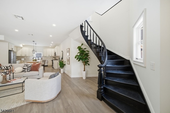 Living Room w/ Staircase View