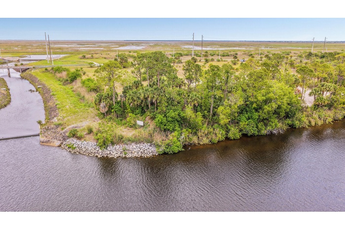 5 acres high above the St Lucie River.