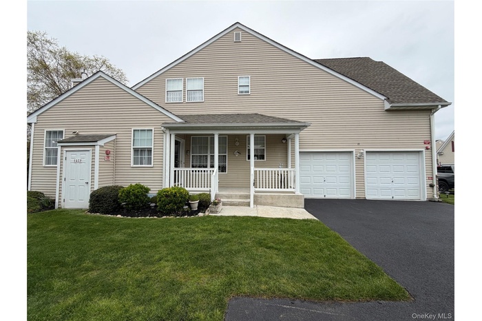Welcome to 19 Meadow Pond Ct., a covered front porch, 2 car garage, 3 extra spaces to park, plus 3 guest spaces on the street!