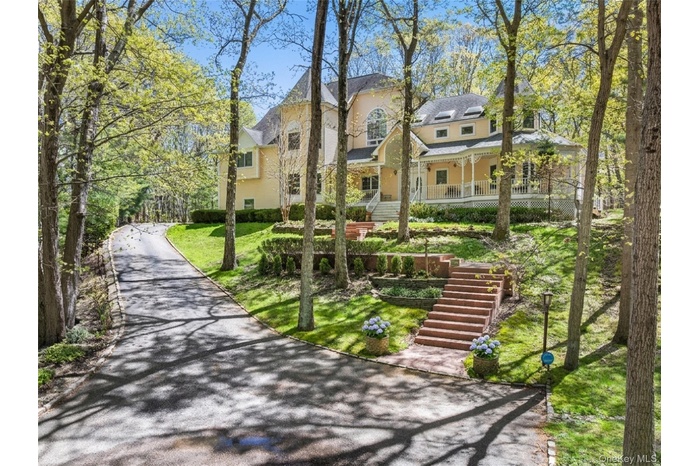 Striking hilltop residence, offering commanding privacy and timeless curb appeal