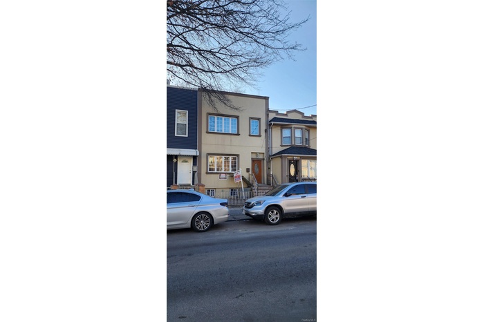View of front of house featuring stucco siding