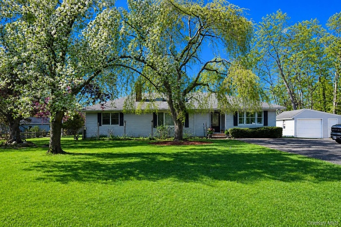 Beautifully landscaped Ranch in the Hamlet.