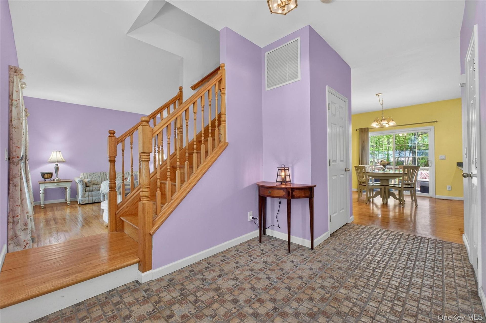 Home Sweet Home!  Spacious entry foyer leads to living room, kitchen and formal dining room.