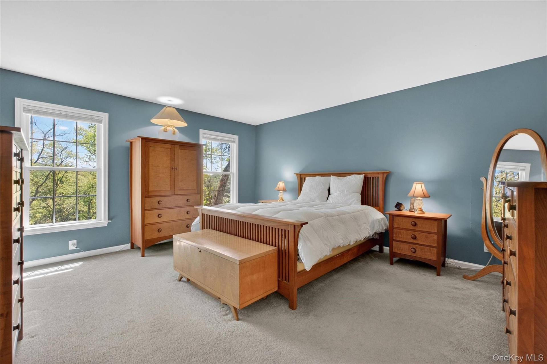 Spacious primary bedroom.  Large enough for a king size bed and sitting area.