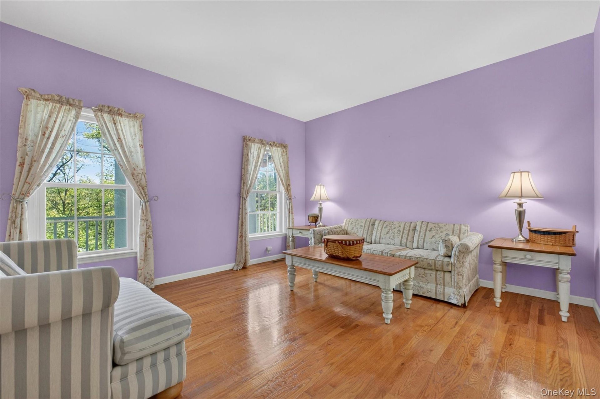 Formal living room with seasonal views of the lake.