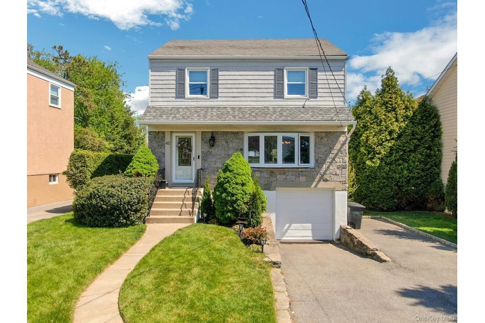 Welcome to 45 Highland Avenue.  A view of the 3 car driveway parking