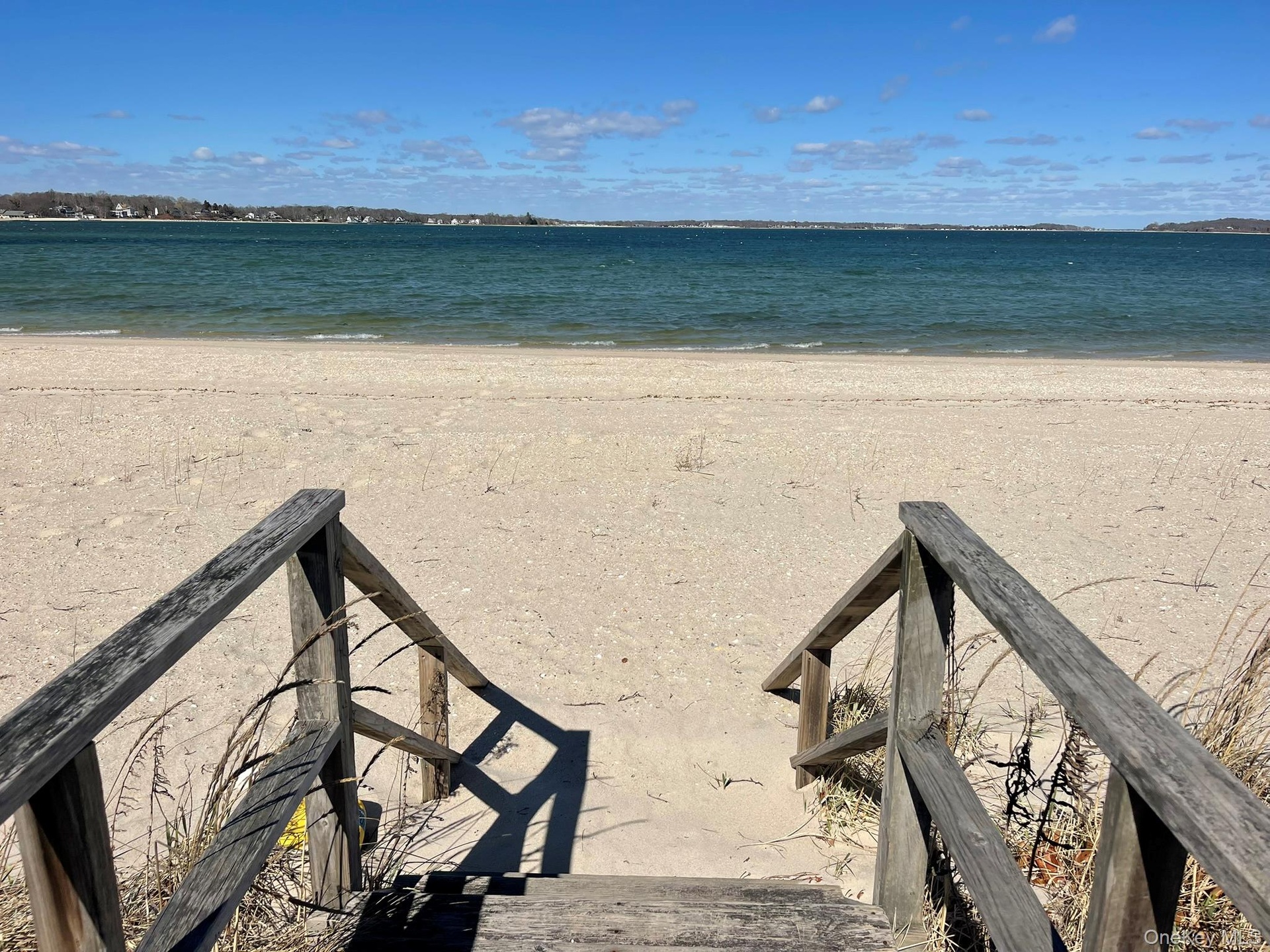 Property view of water with a beach view