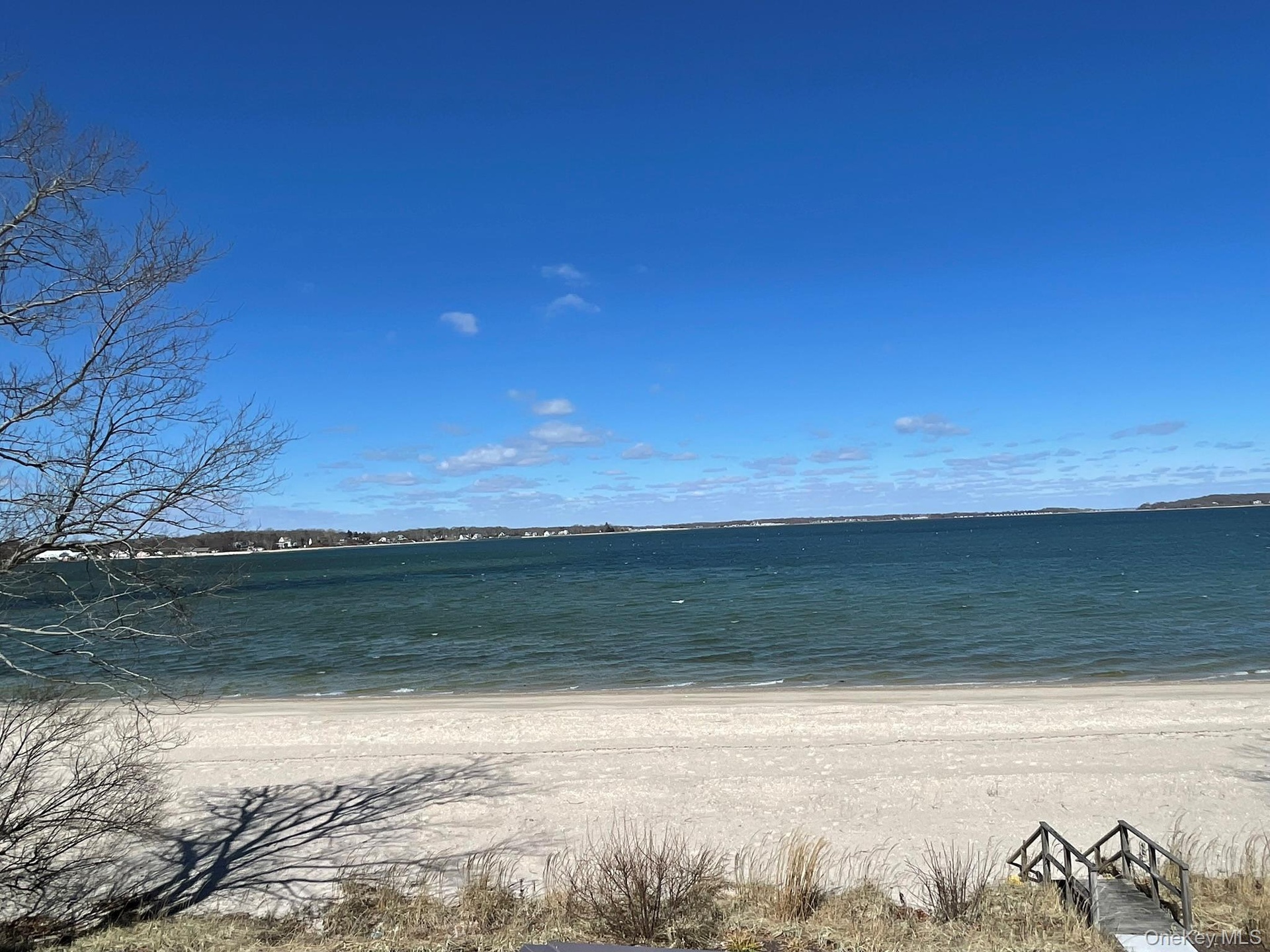 Property view of water featuring a beach view