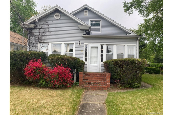 Beautiful historical home with great bones, natural light, and lovely hardwood floors throughout.