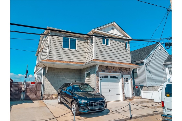 Parking for 3 cars!  And a 2 car garage.