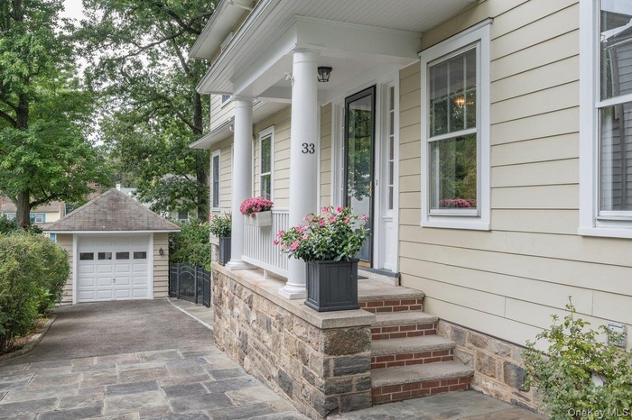 Welcome to 33 Young Avenue, a beautiful classic Colonial just 0.3 miles from Metro-North.