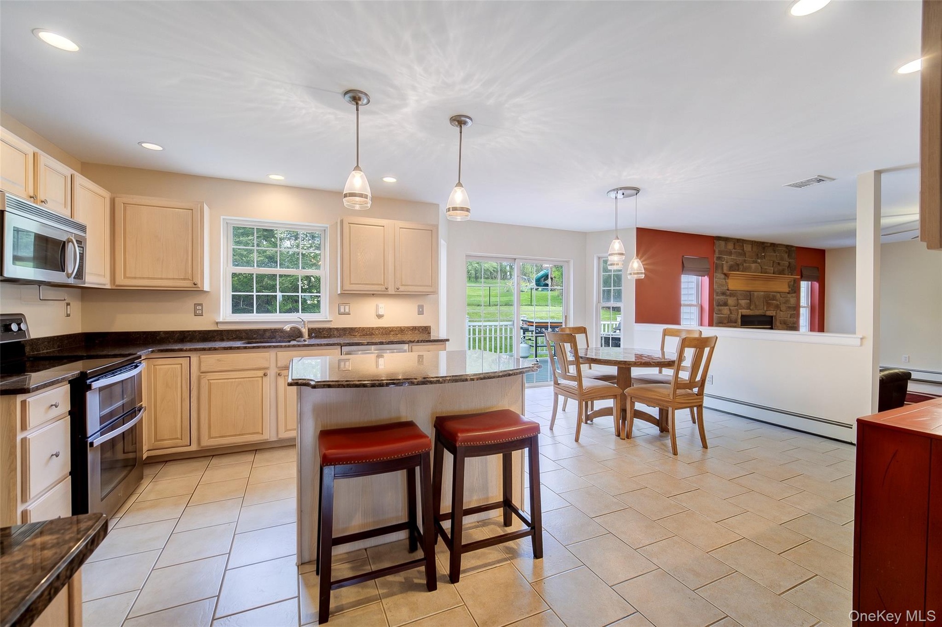 Center Island, custom lighting and tiled floor