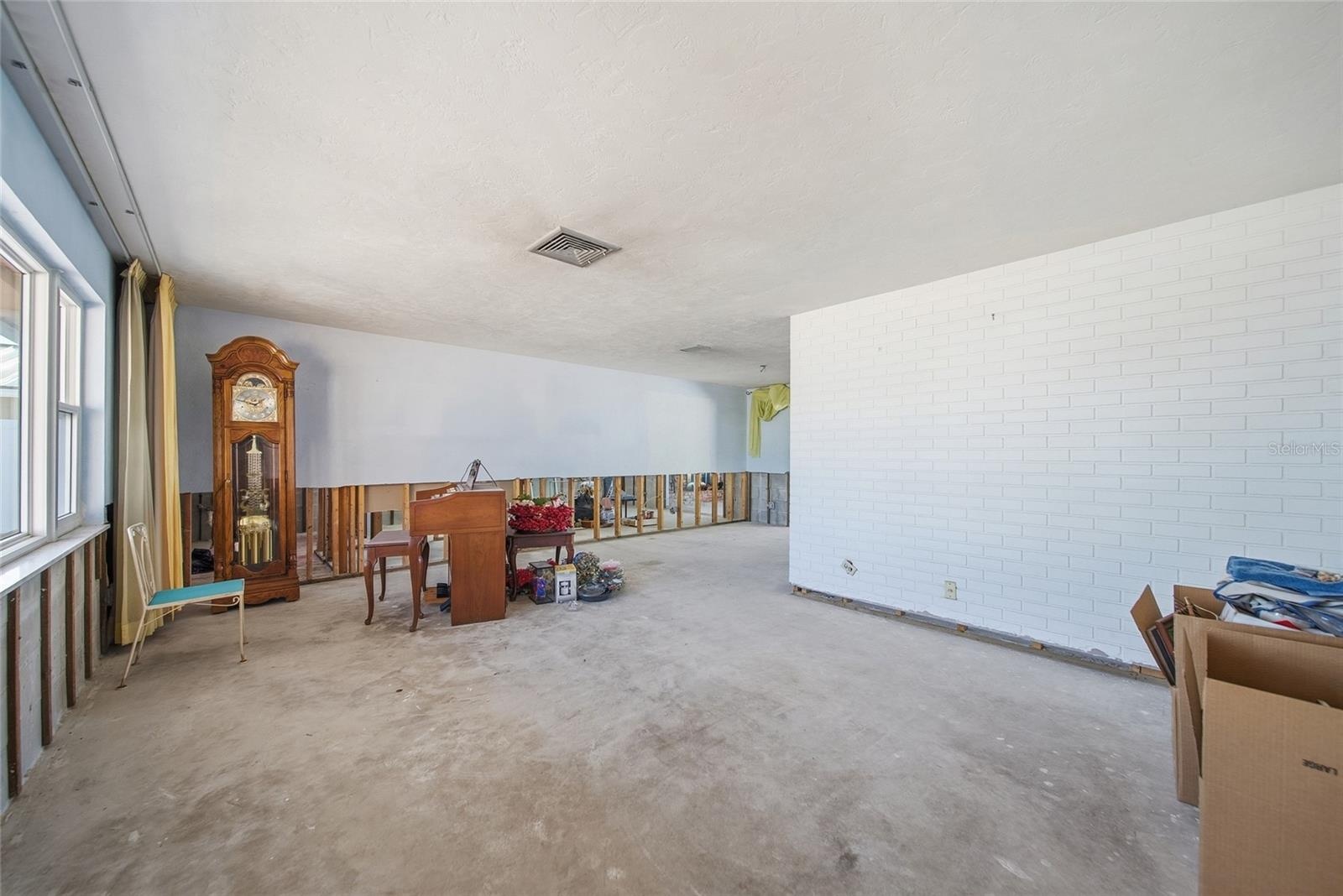 Living room in the front of the home to the right of the entry foyer.