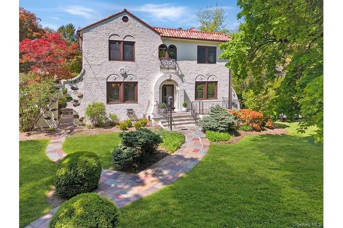 Classic Mediterranean architecture, oversized living spaces, and exceptional outdoor entertaining come together at 62 Broadfield Road.