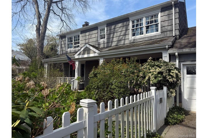 Front of house with private porch entrance