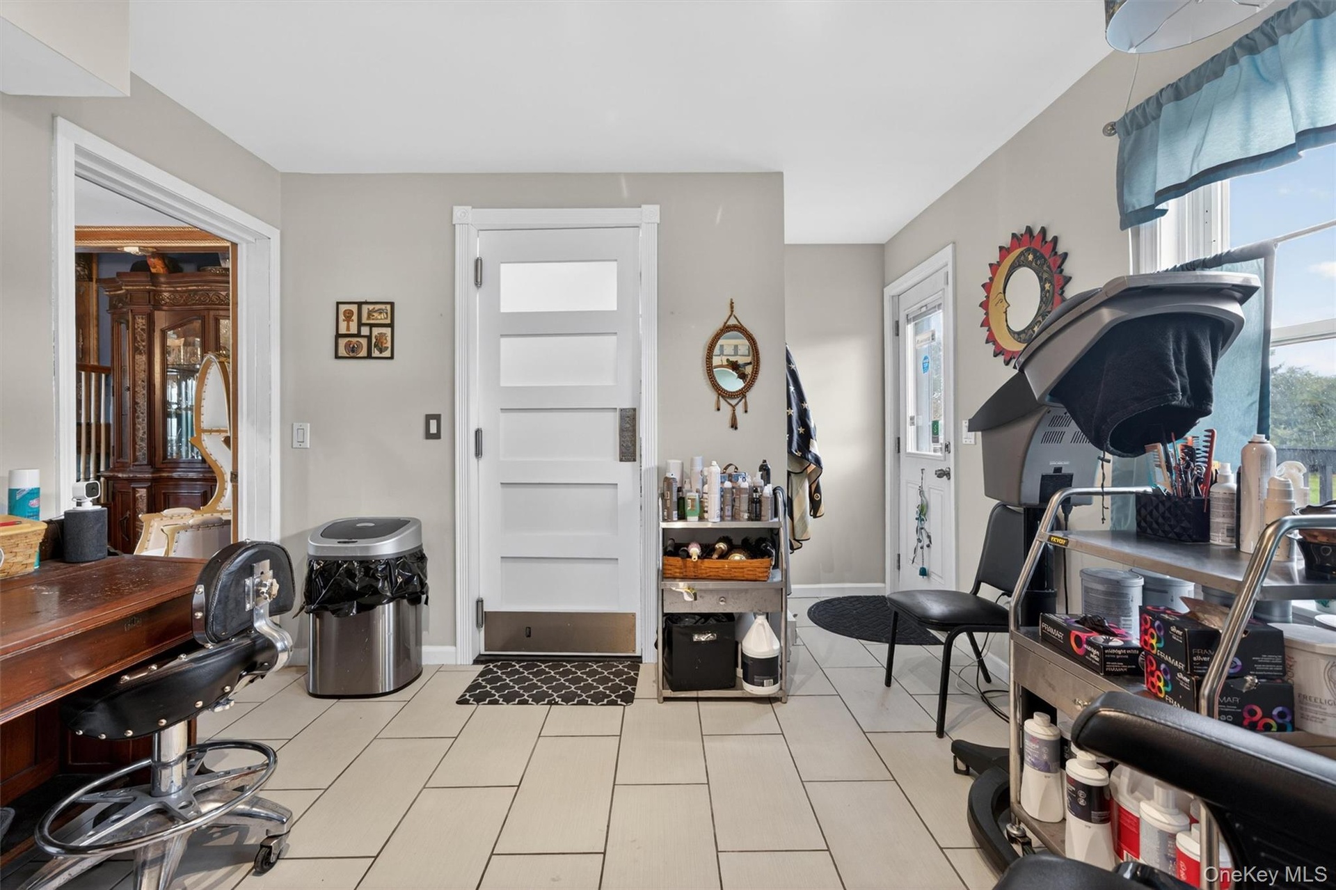 in home barber shop...can be converted to mud room. Has separate entrance.