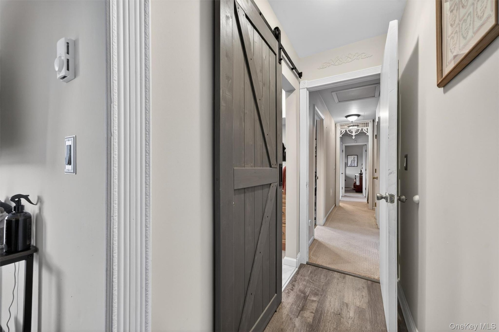 hallway from barbershop to laundry/kitchen