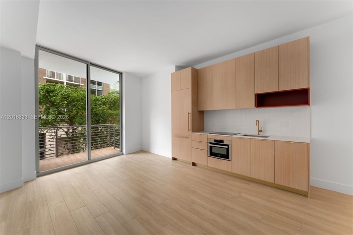 The Standard Residences Midtown Miami features a collection of refined studio, one-bedroom, one-bedroom + den, and two-bedroom pieds-á-terre. Photo is