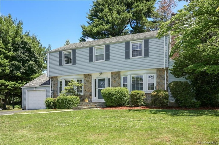 Beautiful Center Hall Colonial located in the heart of Heathcote
