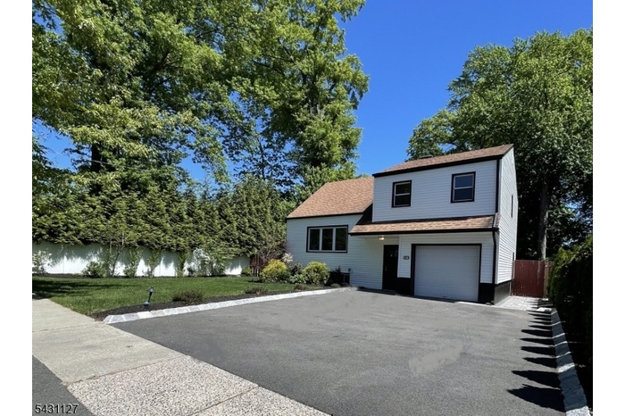 R side garage driveway