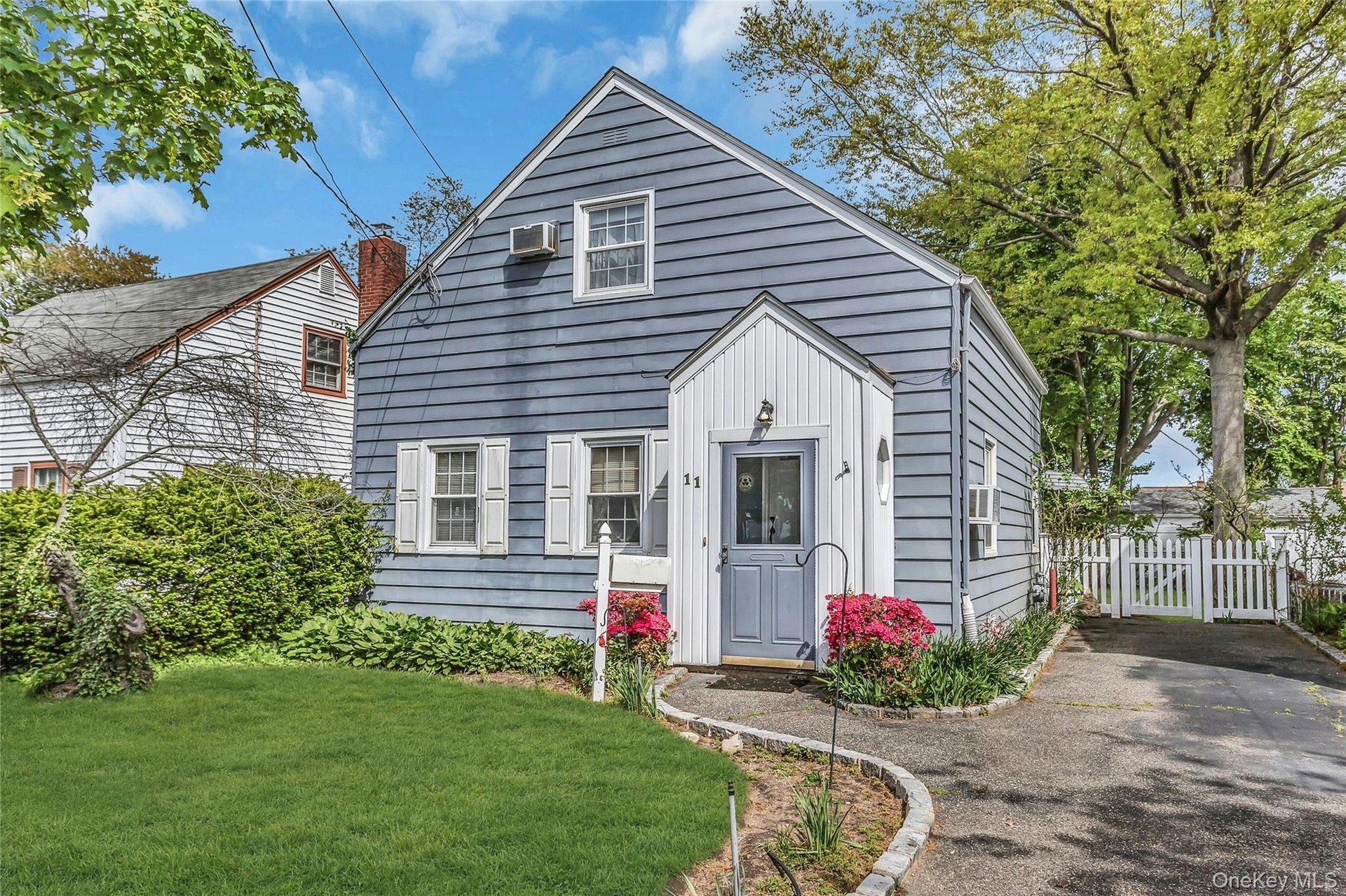 Charming Cape Cod located in the heart of the Motts Creek section of Valley Stream