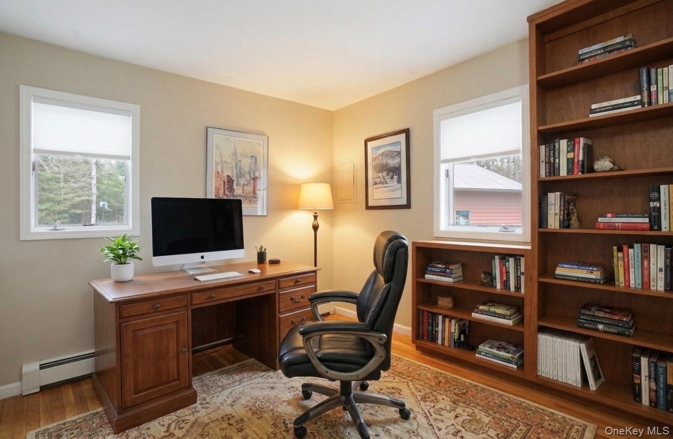 Flex room located on main floor. Photo is virtually staged.