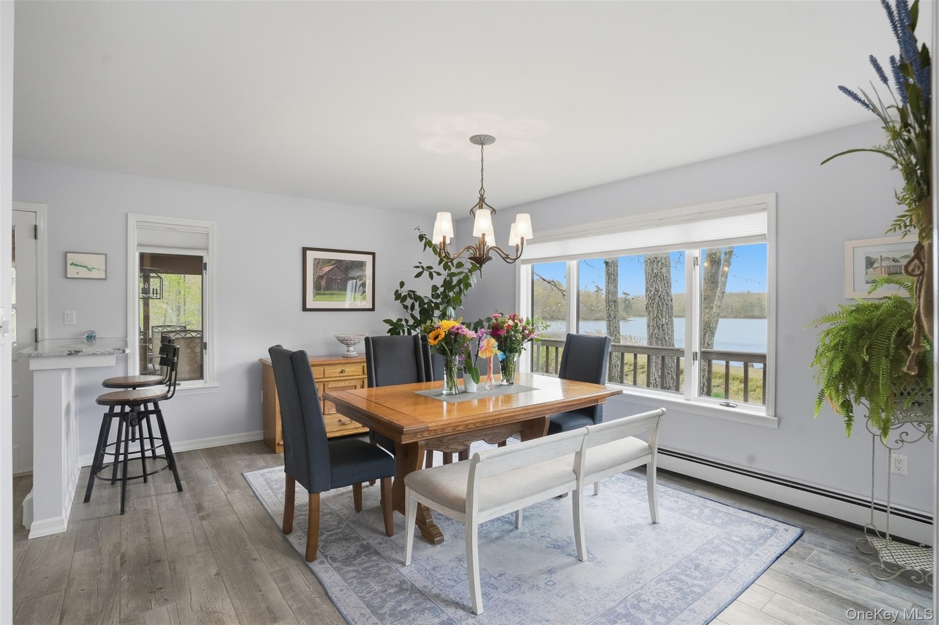 Lovely view. Dining room features breakfast bar.