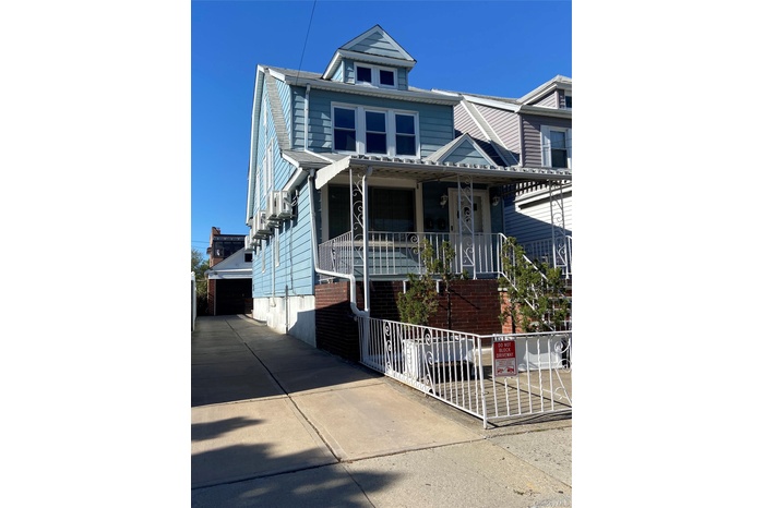 Front of the house with driveway