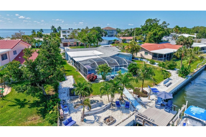 Enjoy the rare luxury of true waterfront living with your own private beach just steps from your door.