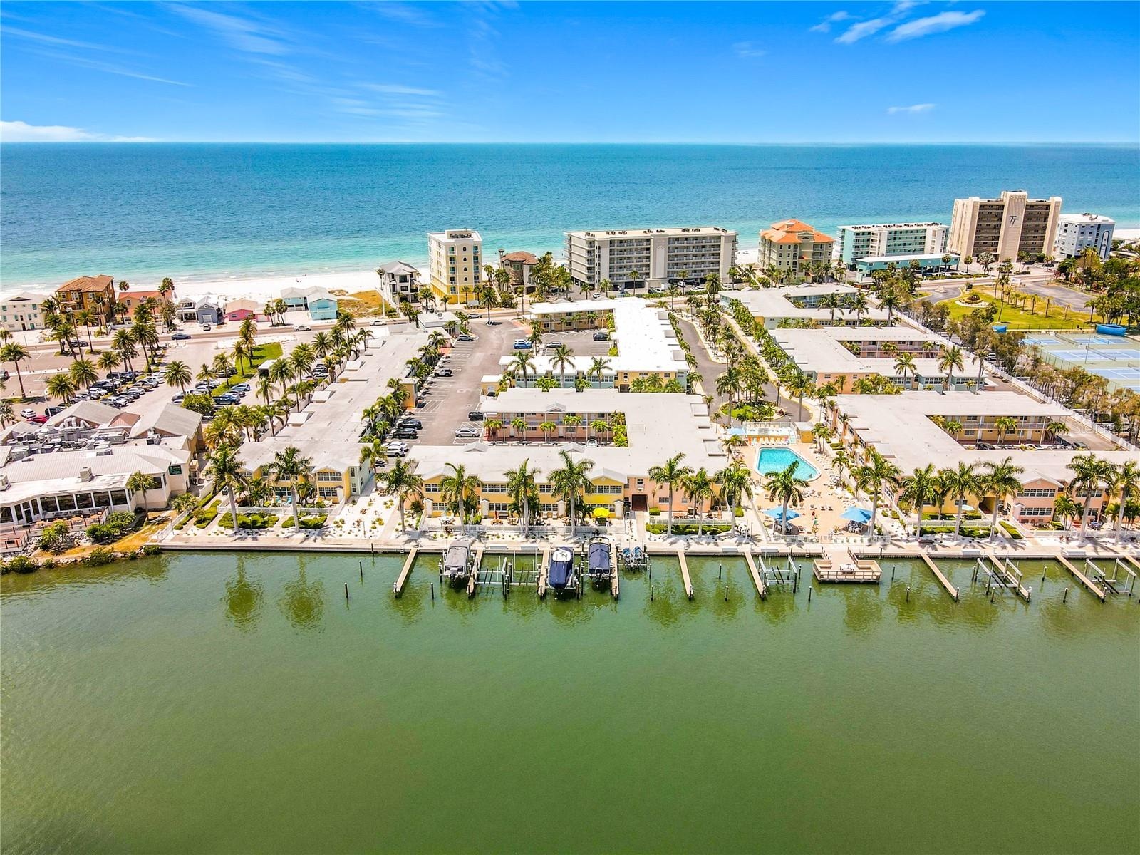 Welcome home to your  customized 2 bedroom, 1 bath direct waterfront condo sitting right on the Intracoastal Waterway at the Barefoot Beach Resort.