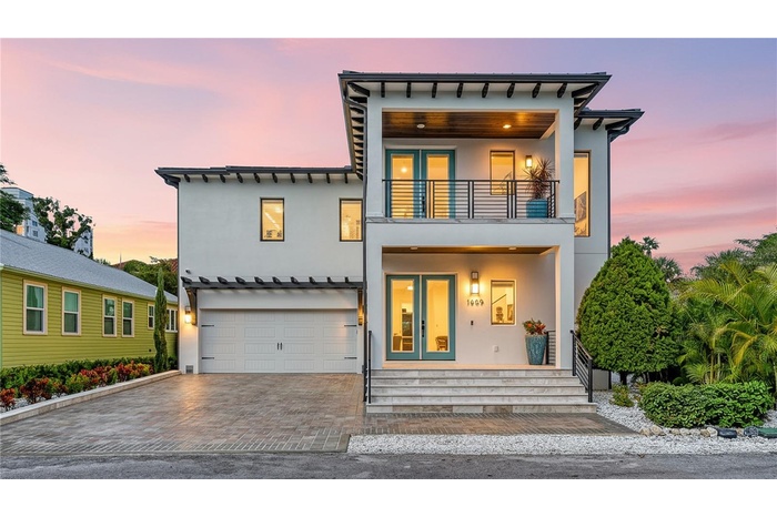Twilight view front of house. Virtually staged