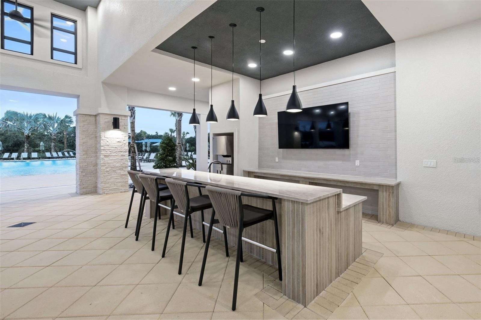 Community clubhouse with gathering space, seating, and an easy place to connect.