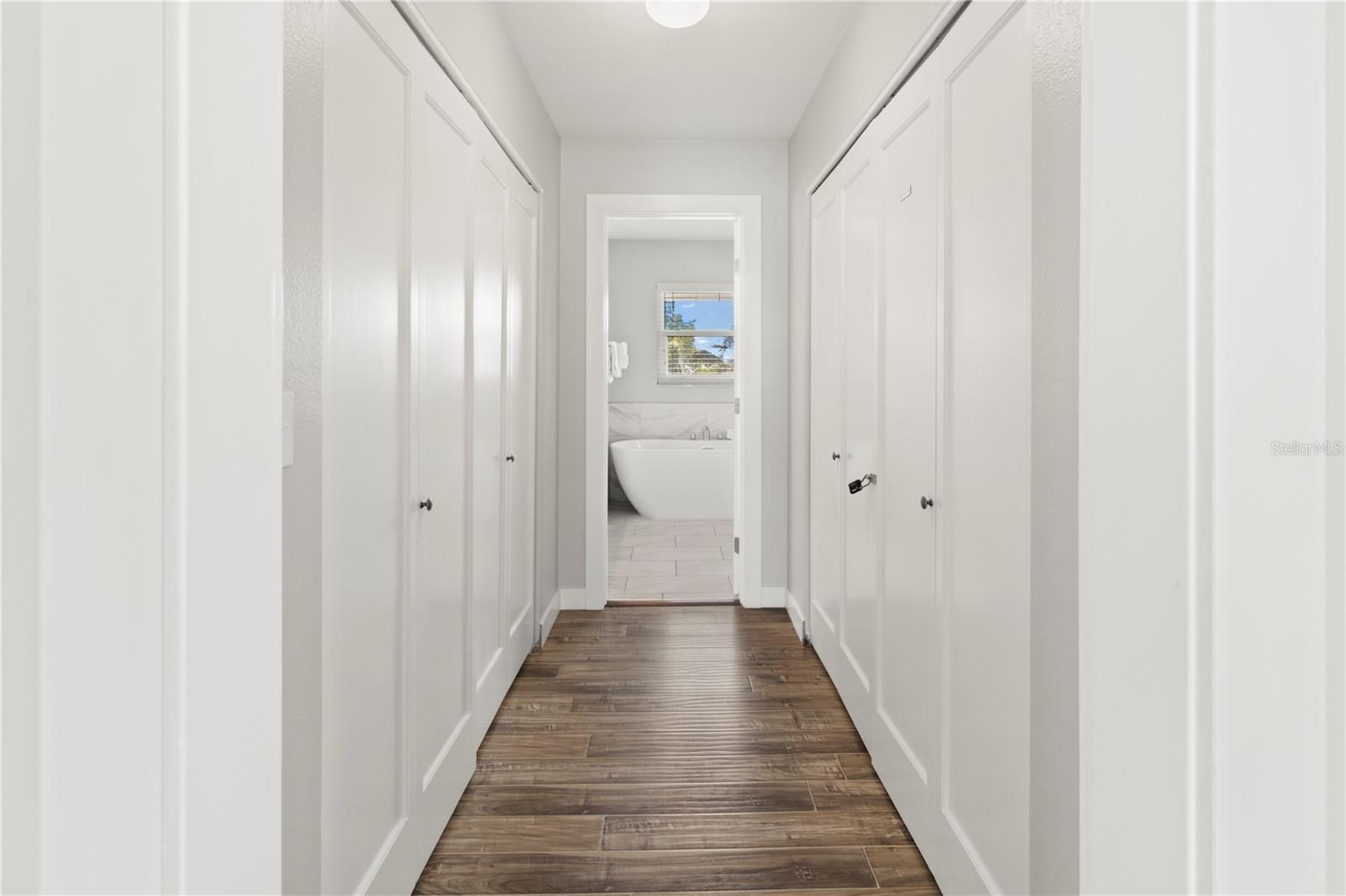 PRIMARY BEDROOM HALL TO BATH