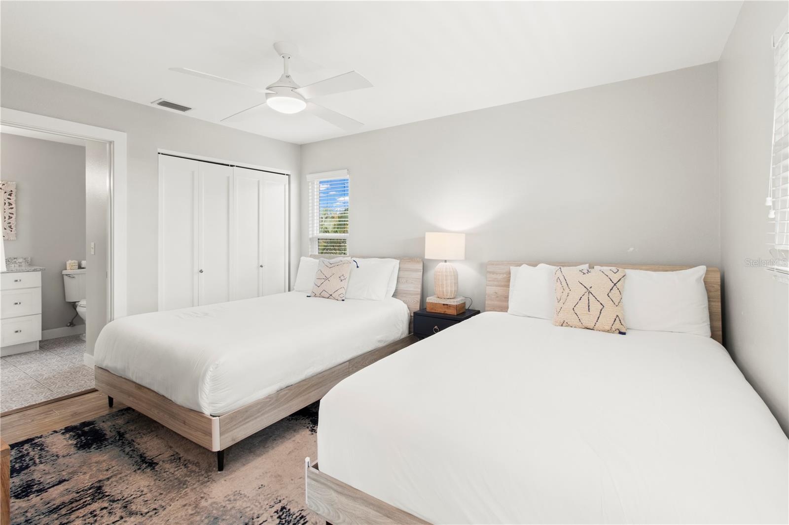 2nd guest bedroom with 2 queens beds