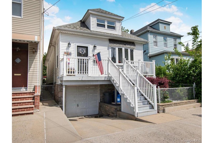 Front of house with welcoming porch