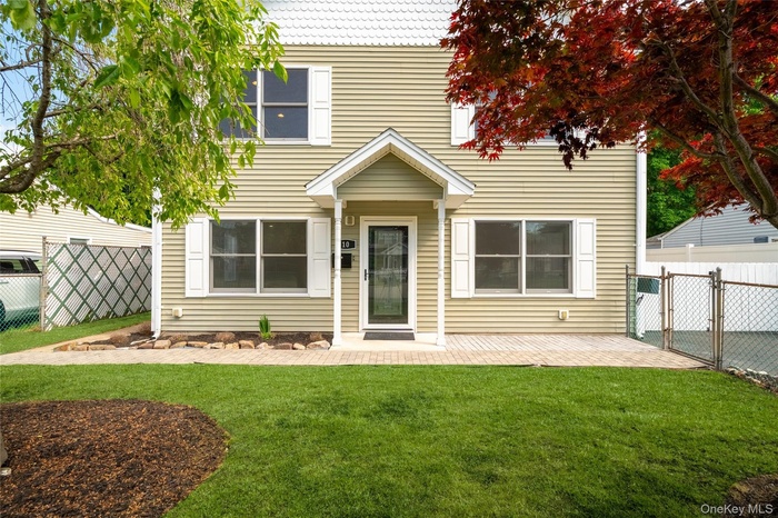 Home situated on a quiet cul de sac with landscaped front yard