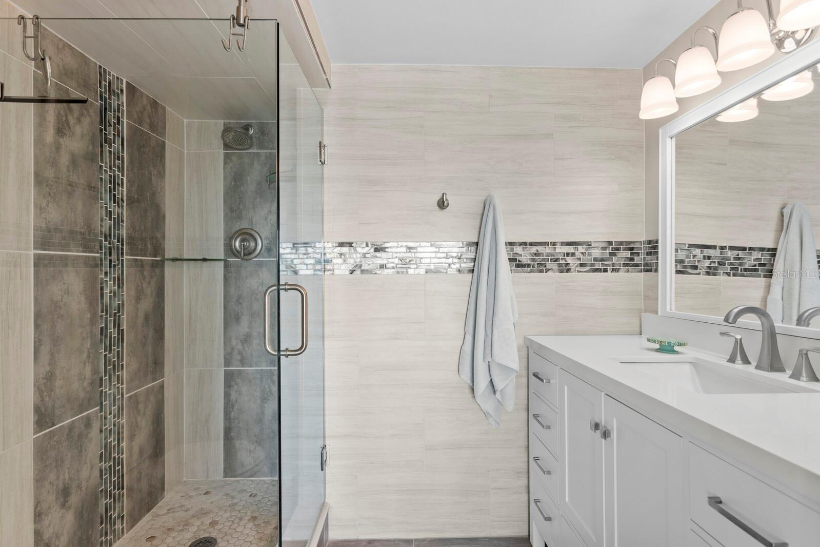 En suite bathroom walk-in shower.