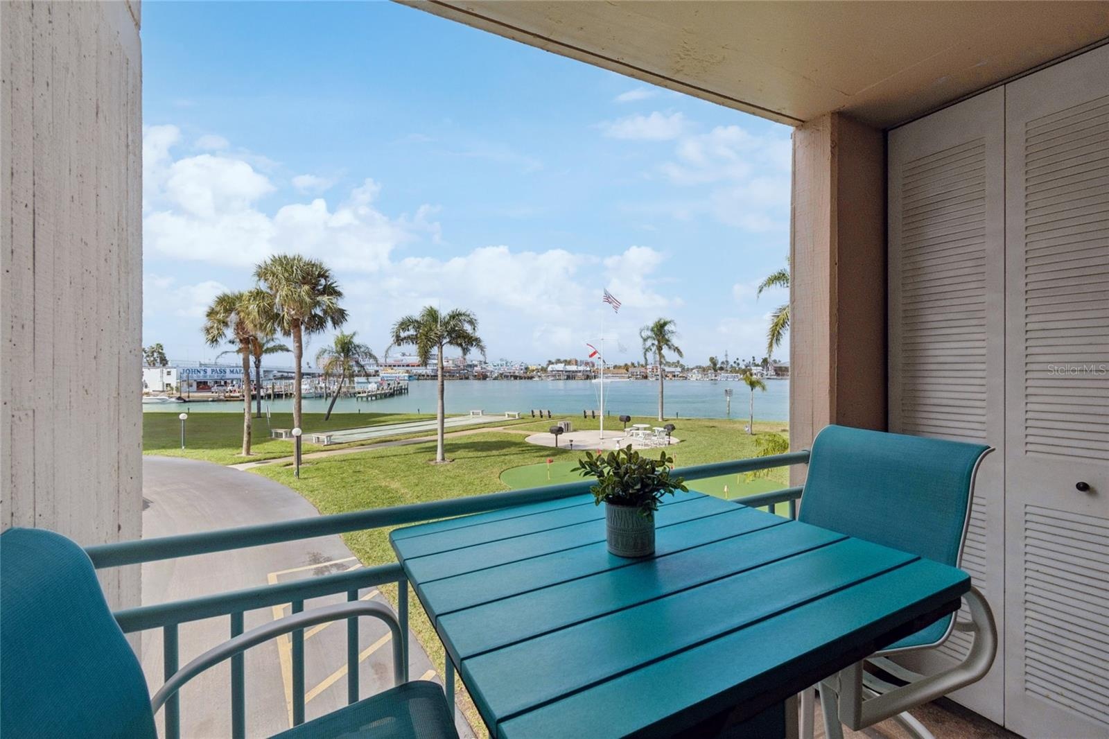 Balcony off the kitchen. Gorgeous view of John's Pass!