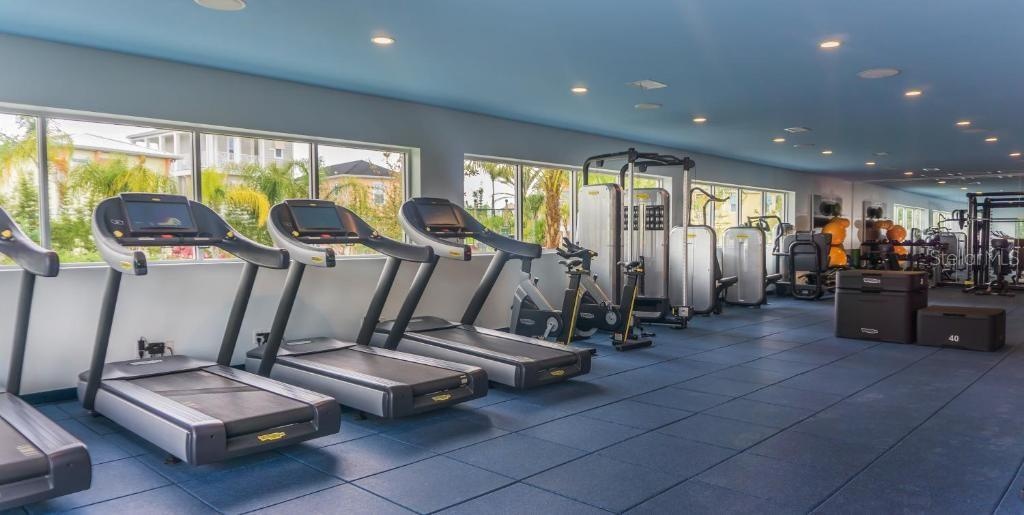 Modern fitness center with equipment in Margaritaville Resort Orlando KissimmeeModern fitness center with equipment in Margaritaville Resort Orlando K
