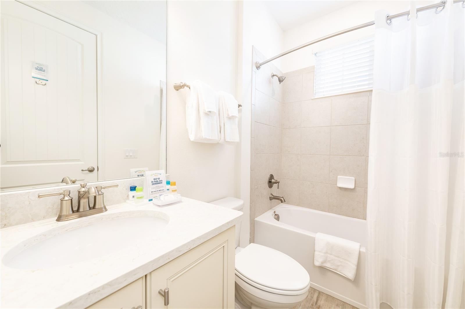 Full bathroom with clean finishes in Margaritaville Resort Orlando vacation home