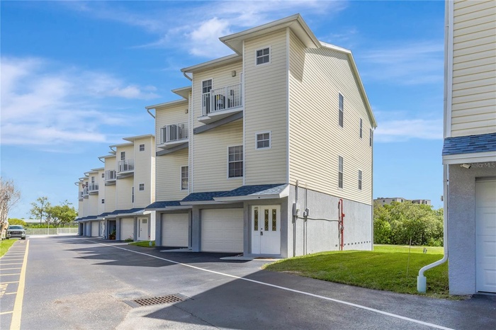 Rare end-unit townhome with water views and direct beach access just steps away.