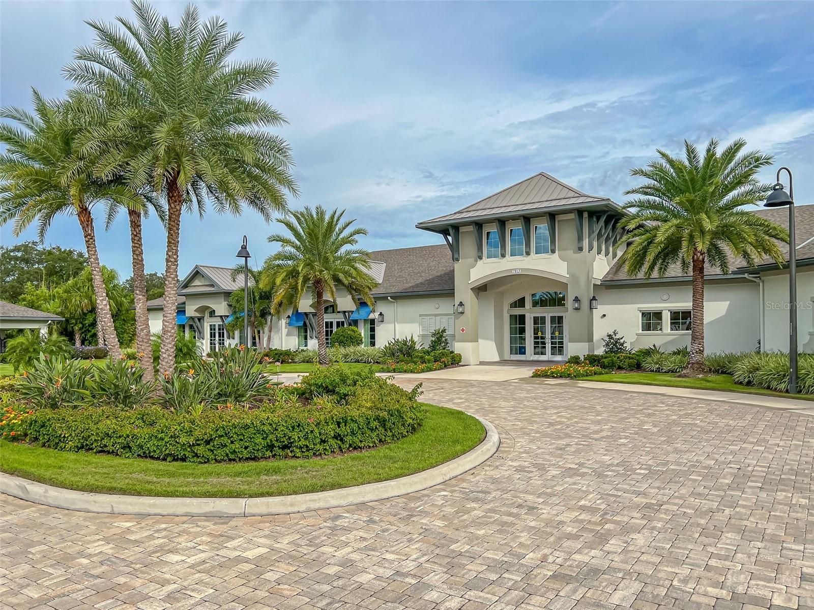 Front entry to the ever-active clubhouse—where social life, fun, and community come together!